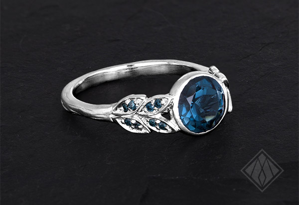 blue topaz leaf ring