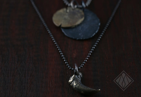 Small claw medallion